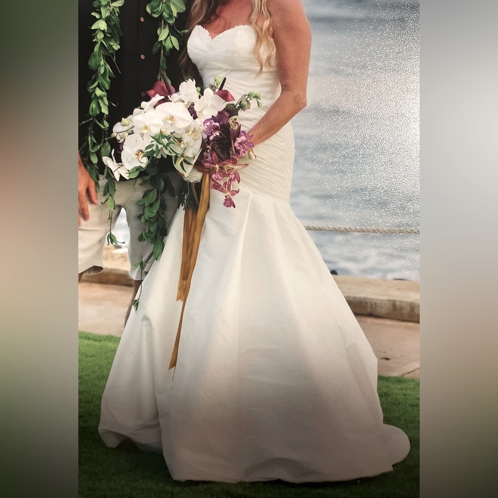 Selling my beautiful wife’s gorgeous wedding dress.